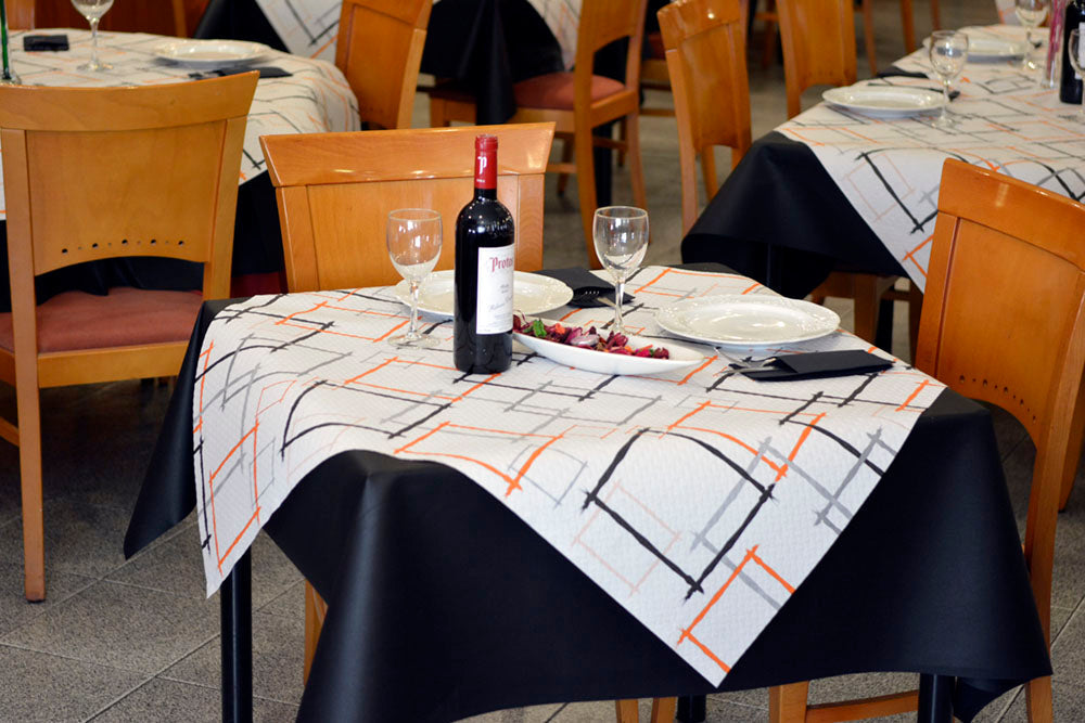 Mantel papel 100x100cm 35gr Pleg. 1/8 Blanco Deco. Marcos Naranja, 150uds(Embols. a 10uds y doblado)